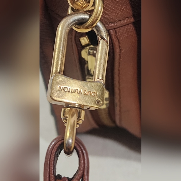 Louis Vuitton Orsay clutch/wristlet. Int & ext pockets have been cleaned out. - Picture 7 of 16